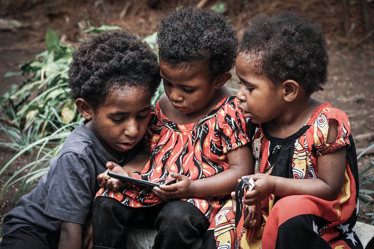 Three Girls Watching on a Cellphone
